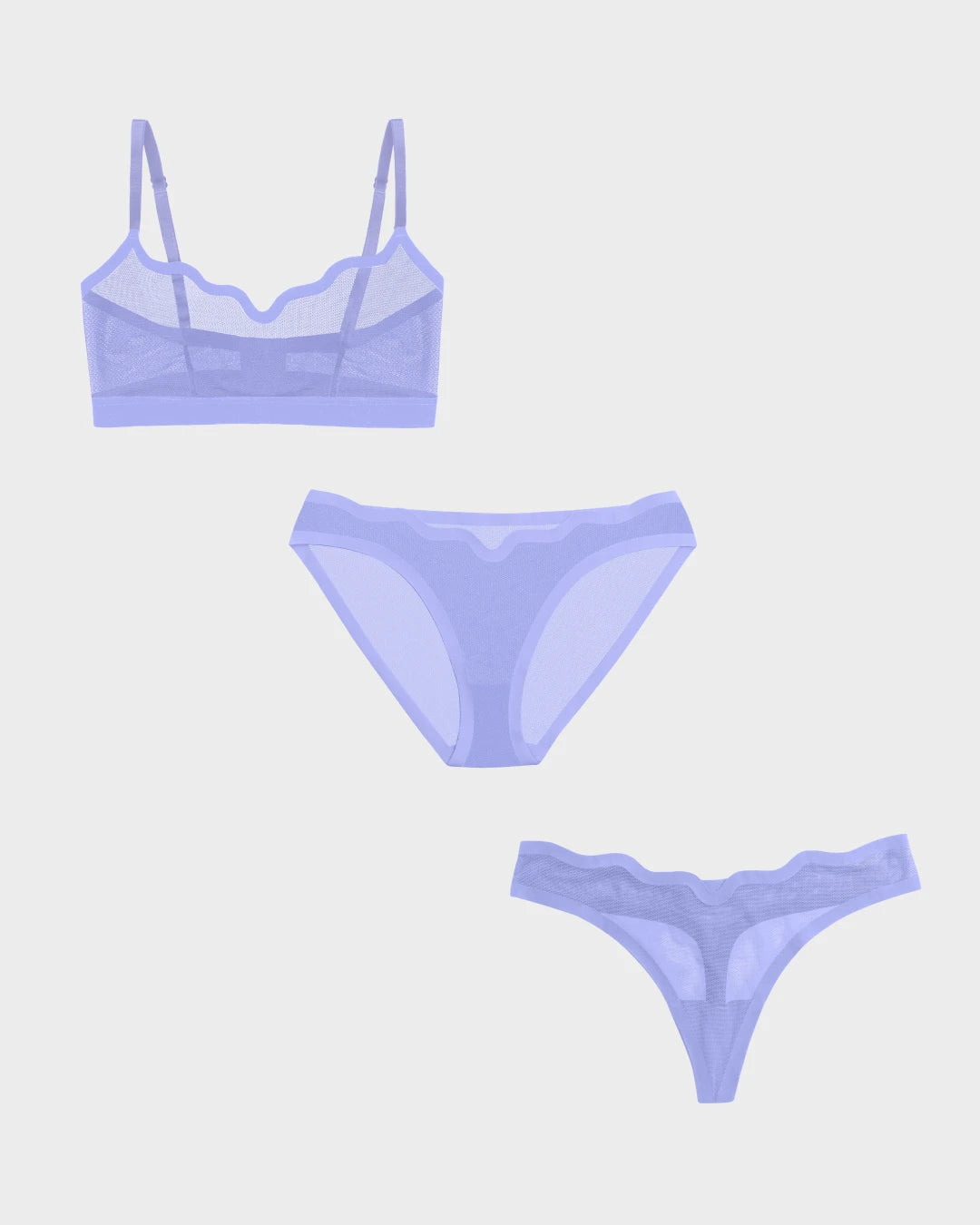 Lucy sheer mesh bra, bikini, and thong laid flat, a periwinkle sheer bra and panty set.
