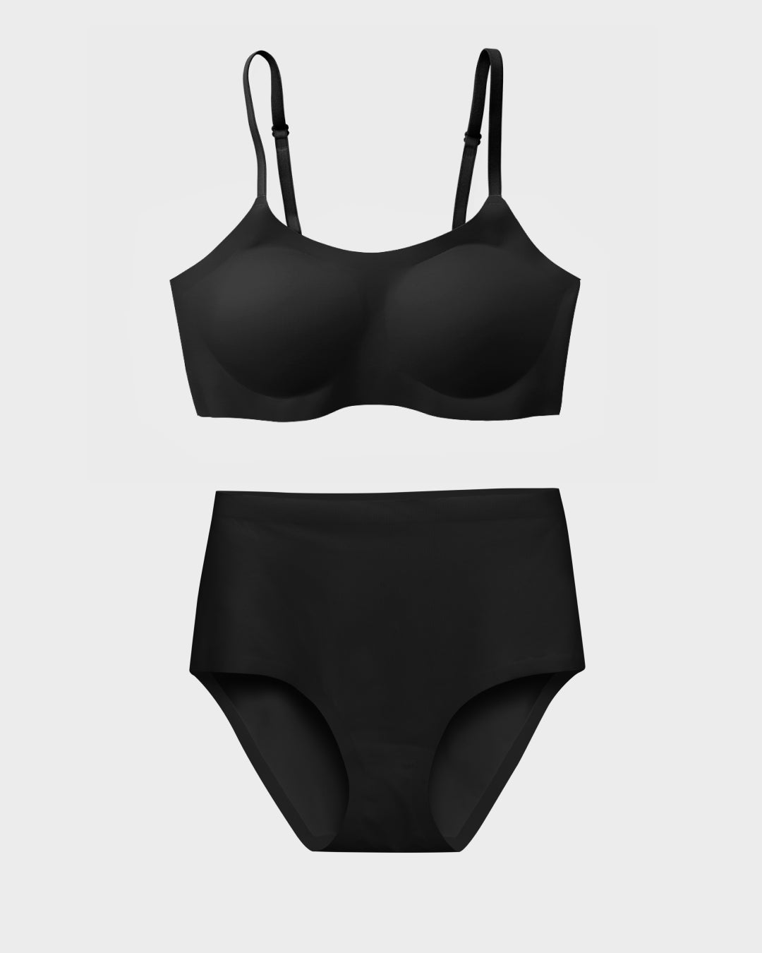 Black support bralette and matching high-waisted panties set in a flat lay.