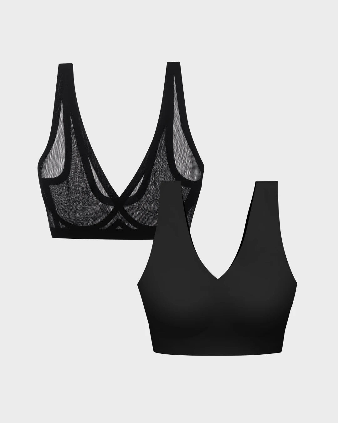 Black sheer mesh bralette paired with a black seamless wireless bra on grey.