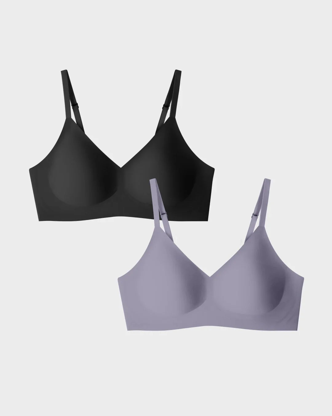 Seamless wireless bra two-pack in black and slate grey with V-neckline and molded cups, product flat view.
