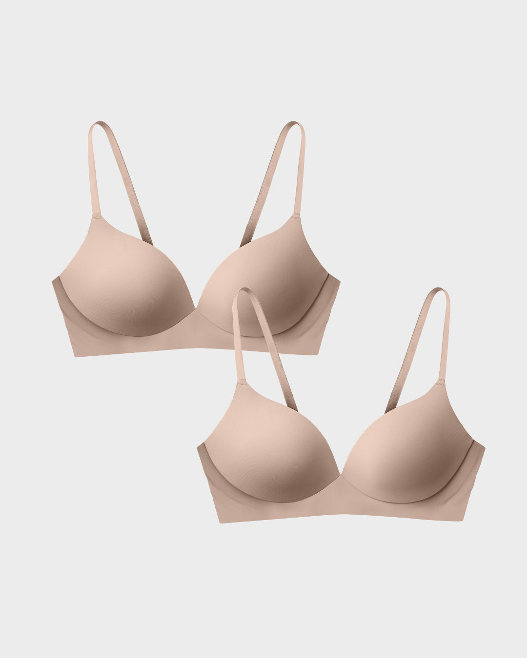 Nude wireless t-shirt bra two-pack in a flat-lay arrangement.