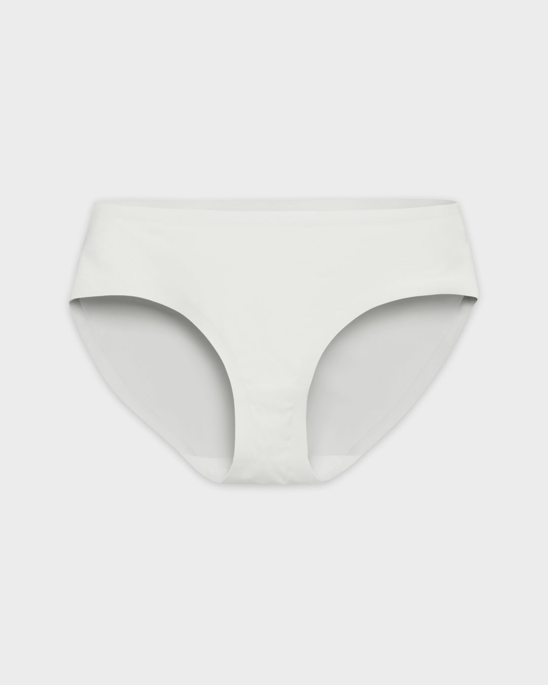 Pearl white seamless brief with modest rise and full coverage, shown flat on grey.