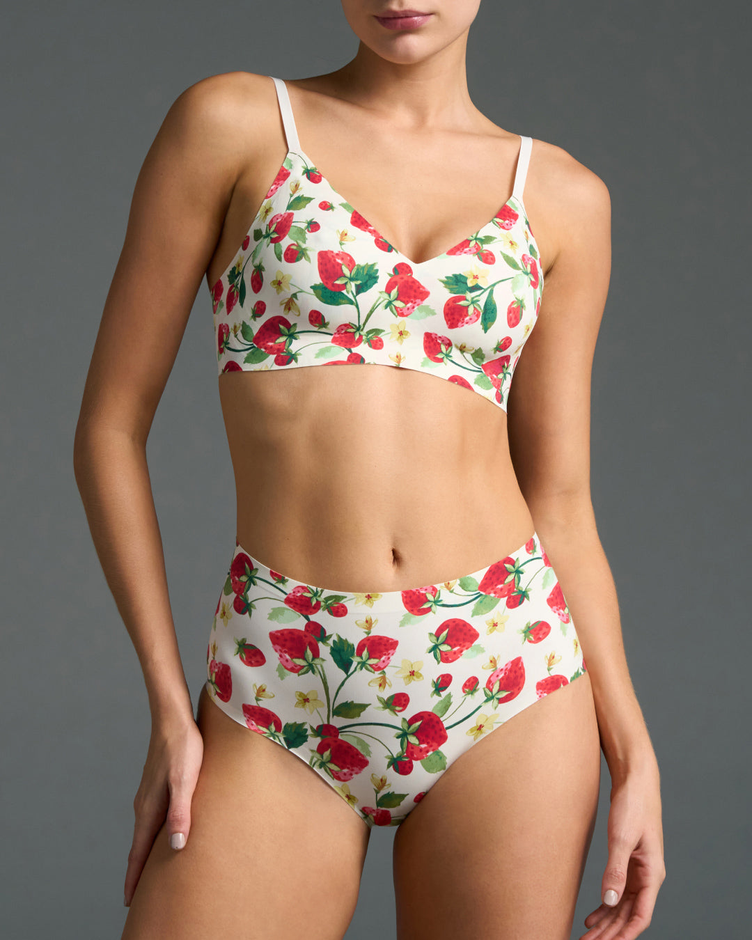 Strawberry patch wireless triangle bralette and high rise no show underwear set shown on model, featuring a white base and seamless design for smooth, invisible comfort under clothing